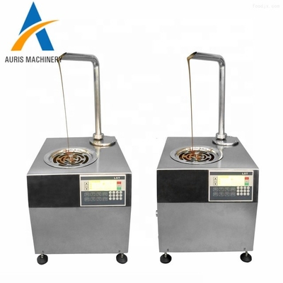 hoàn toàn tự động điều chỉnh nhiệt độ sô cô la nhỏ màu đen máy làm gáo sô cô la bán chạy cho các cửa hàng tráng miệng